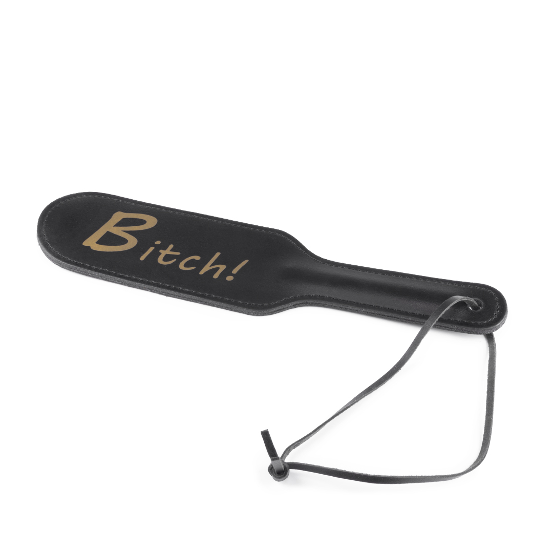 Lederpaddel „Bitch“ schwarz/gold