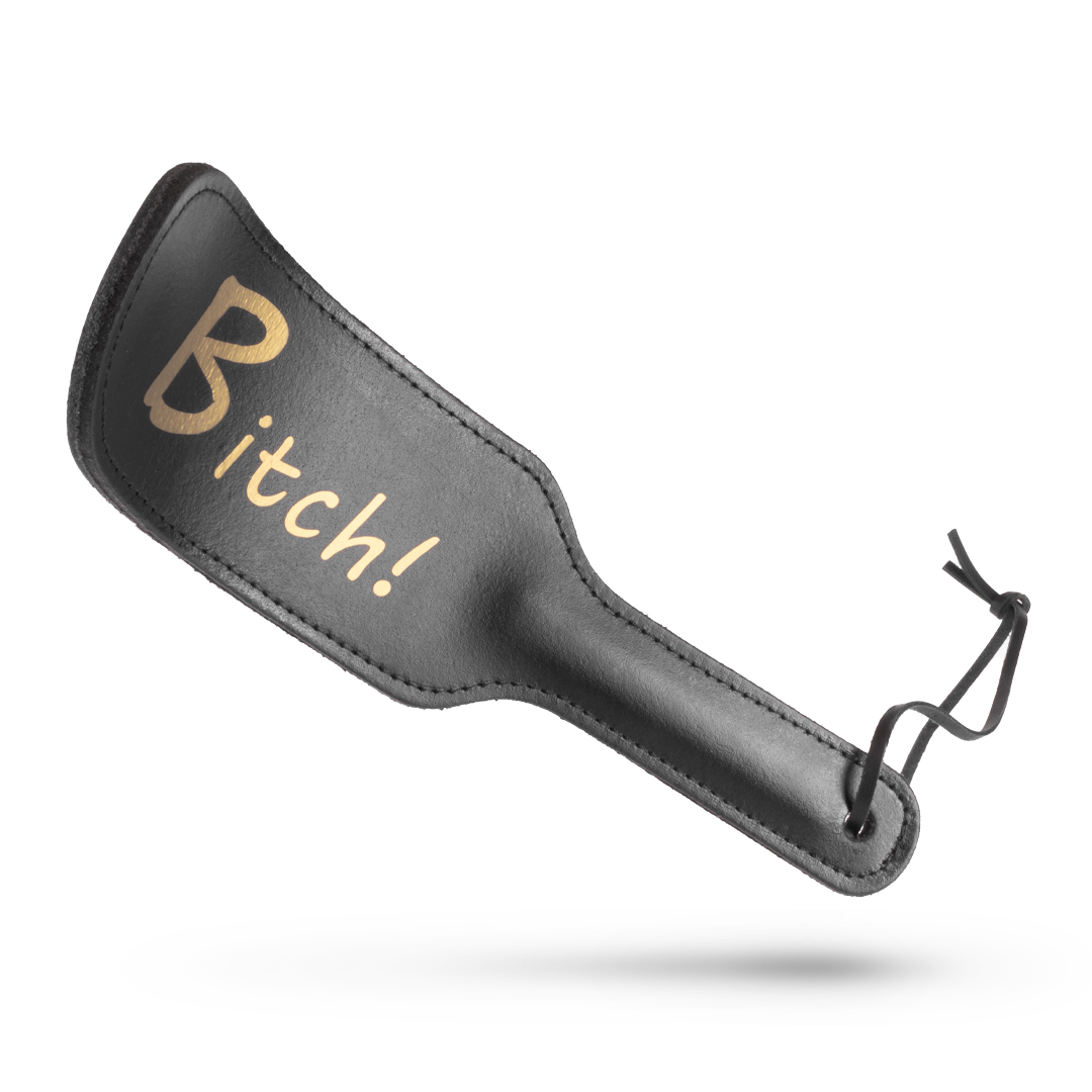 Lederpaddel „Bitch“ schwarz/gold