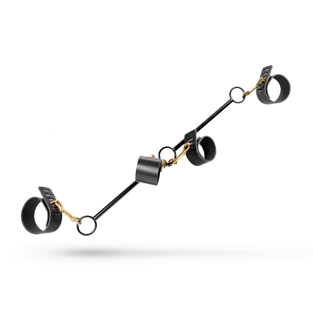 Bar with leather ankle and wrist cuffs black/gold